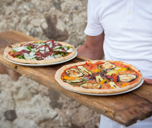 Pizzas auf Holztableau